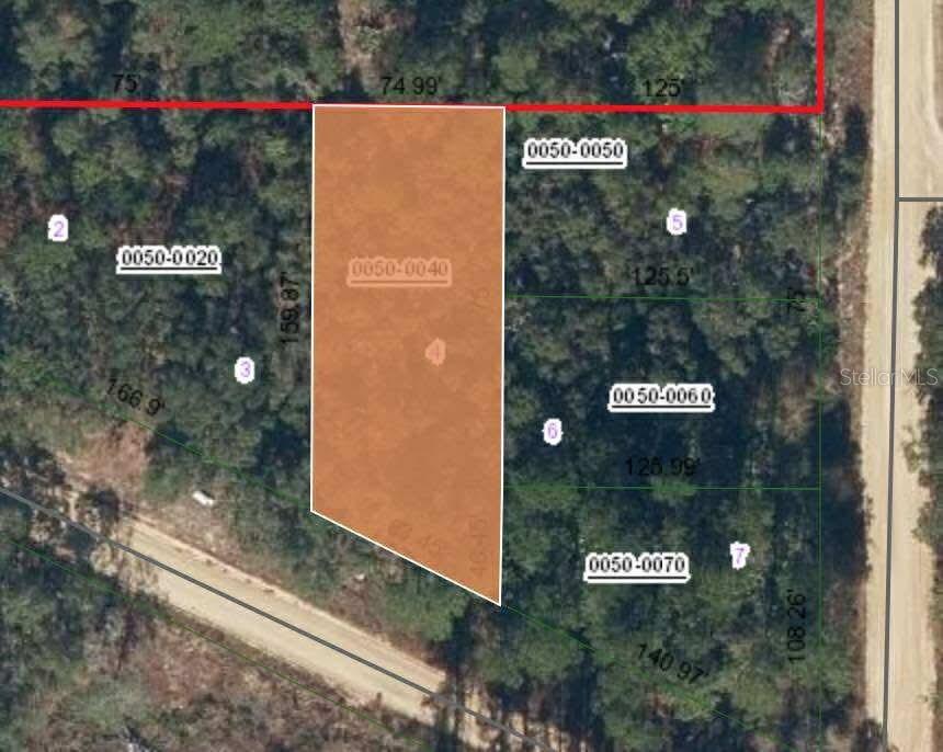 Don't miss this fantastic opportunity to own a 0.31-acre parcel in the growing community of Interlachen Lakes Estates! This vacant lot offers endless potential with no build-time requirements—build now or hold for future investment. Zoned (R-2), this property is ideal for a wide variety of residential dwelling types, giving you the flexibility to create the lifestyle you envision. Located in an area showing strong signs of growth and development, this is a great chance to invest in a promising future. Buyer is responsible for well and septic installation. Whether you're looking to build your dream home or expand your investment portfolio, this lot is full of possibilities!