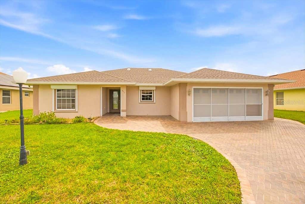 Photo of 477 Sweetwater Way, Haines City, FL 33844 (MLS # O6431674)