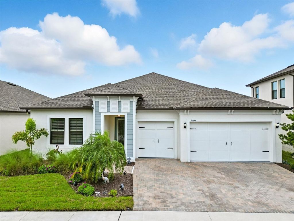 Photo of 21554 Snowy Orchid Terrace, Land O Lakes, FL 34637 (MLS # W7878615)