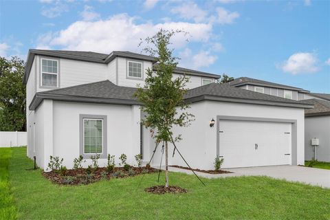 Photo of 13288 Tula Loop, Astatula, FL 34705 (MLS # TB8412091)