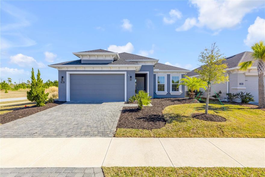 Located in the desirable Mosaic community of Daytona Beach, this beautifully maintained single-family home offers 4 bedrooms, 2 bathrooms, and 2,003 square feet of thoughtfully designed living space. Built in 2023 and set on a corner lot, the home combines modern construction with a bright, open layout that immediately stands out and includes the added peace of mind of a transferable builder warranty and an annually renewable termite bond. Upon entry, high ceilings and an abundance of windows create an airy feel and fill the main living areas with natural light. The open floor plan seamlessly connects the living room, kitchen, and dining area, making the space both functional and inviting. Upgraded lighting enhances the home throughout, and the living room features a three-panel sliding glass door that opens to an extended, screened-in lanai with a ceiling fan, overlooking a private backyard with a lovely lake view. The kitchen is well appointed with stainless steel appliances, a center island, and a walk-in pantry, while the dining area is framed by windows that enhance the light-filled setting. The primary bedroom is privately situated and includes an en suite bathroom with dual sinks, a spacious walk-in shower, and a walk-in closet. A split-bedroom layout offers flexibility and separation throughout the home. Mosaic residents enjoy a full suite of amenities, including resort-style pools and a resort clubhouse with a full kitchen, indoor and outdoor banquet seating, a fitness center, playground, fire pit, band shell, and fishing pier, along with regular monthly resident social activities. The location is hard to beat, with close proximity to top golf courses, shopping outlets, grocery stores, restaurants, and easy highway access. Best of all, the coast and Daytona Beach’s most popular beaches are just minutes away. Schedule your showing today! Mortgage savings may be available for buyers of this listing.