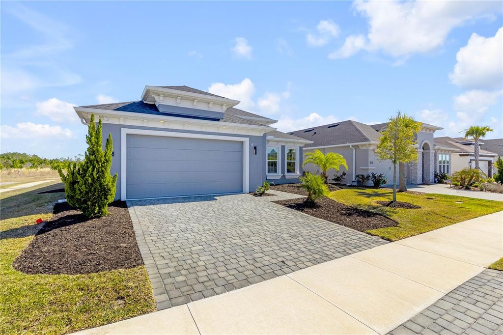 Photo of 246 Azure Mist Way, Daytona Beach, FL 32124 (MLS # O6379482)