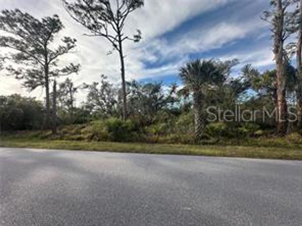 Photo of 883 Bowman Terrace, Port Charlotte, FL 33953 (MLS # A4666566)
