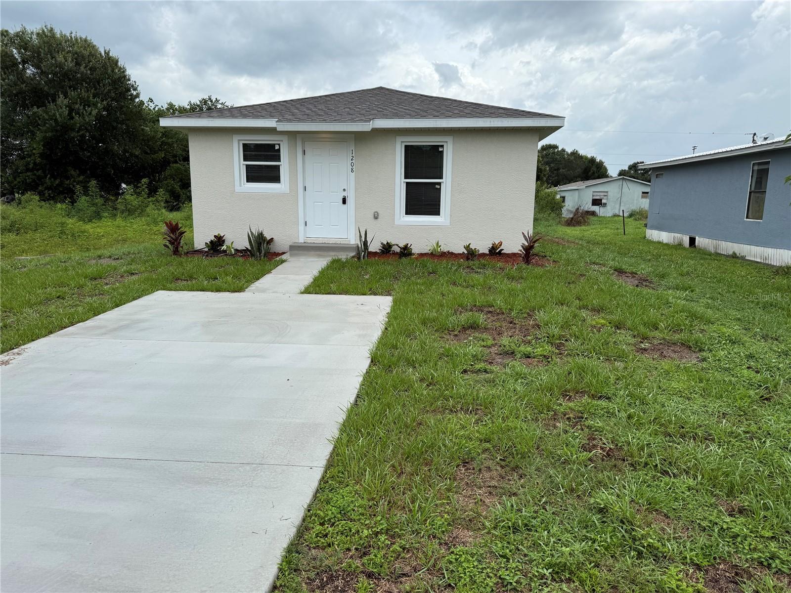 New Construction! Ready to move in! Brand new two bedroom/ two bathroom concrete block home with a bonus room. Home features luxury vinyl flooring though out, granite countertops, walk-in shower in the master suite, stainless steel appliances and more. Centrally located in town near schools, shopping, restaurants and parks. Schedule your showing today!
