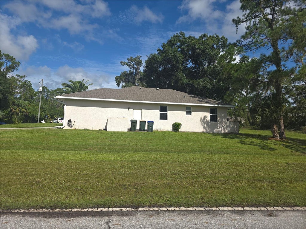 Photo of 4038 Langsom Lane, North Port, FL 34286 (MLS # D6148318)