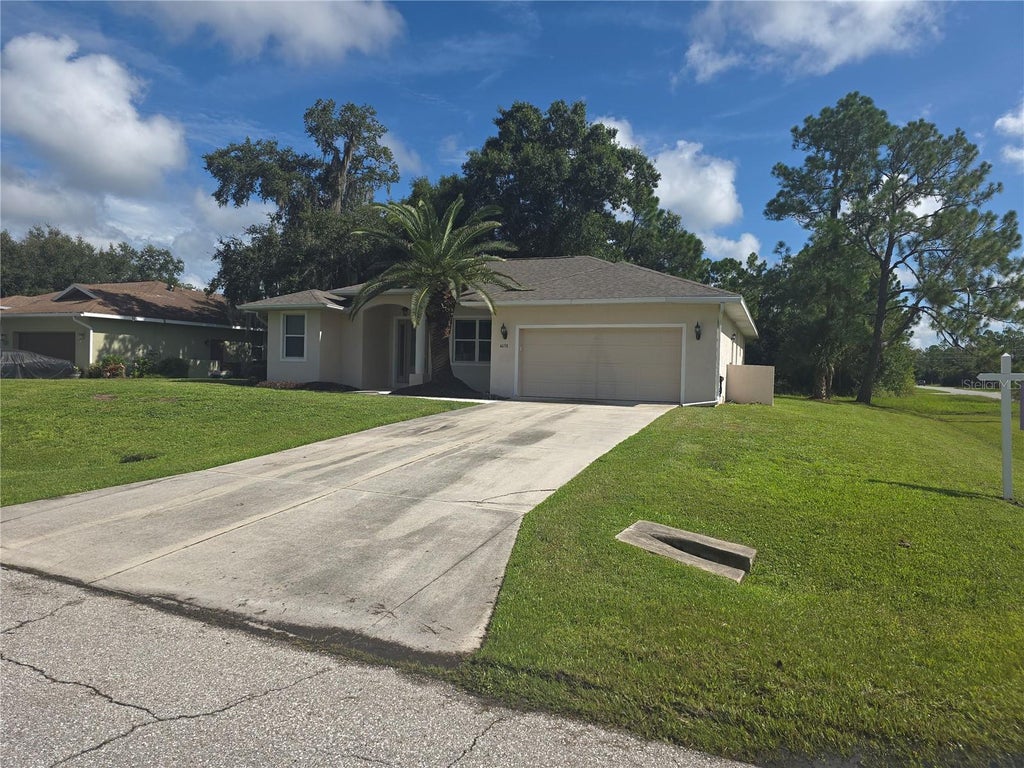 Photo of 4038 Langsom Lane, North Port, FL 34286 (MLS # D6148318)