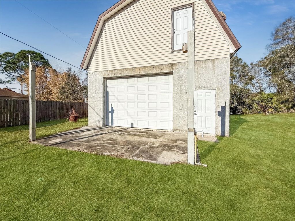 Photo of 1650 Burgundy Street SE, Palm Bay, FL 32909 (MLS # FC316348)