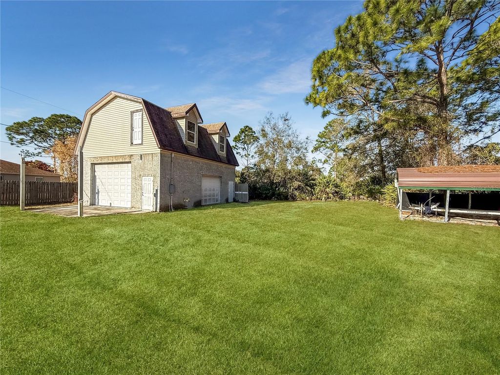 Photo of 1650 Burgundy Street SE, Palm Bay, FL 32909 (MLS # FC316348)