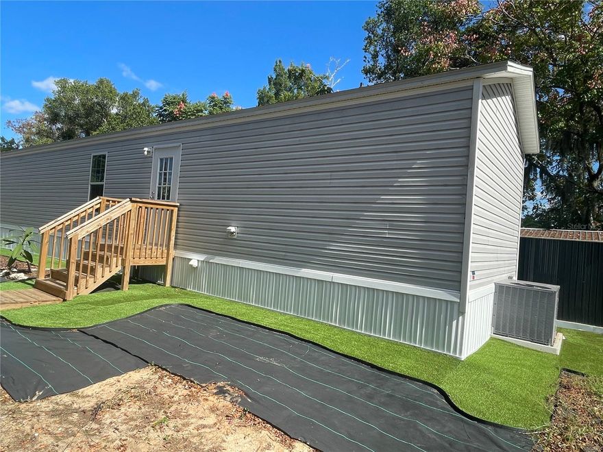 Move-in ready 2024 Energy Star-certified manufactured home. 2 bedrooms, 2 full baths. Energy-efficient,
low-maintenance design with bright open floor plan, LED recessed lighting, and textured-finish ceiling. Kitchen
features stainless steel sink, appliance package (refrigerator, range, dishwasher), under-sink water filter,
laminate countertops, and matching backsplash. Dunnellon suits primary homes or weekend retreats with its
small-town vibe, historic districts, and proximity to springs (about 20 minutes from Rainbow Springs). Nearby
communities appealing for outdoor enthusiasts seeking a nature-focused lifestyle. Real estate often highlights trail and river perks for crash pads or full-time living.