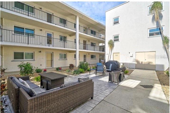 Welcome to this charming first-floor 2-bedroom, 2-bathroom unit located in the desirable Holiday Condominiums, a vibrant 55-plus community nestled in the heart of Venice Island. This beautifully maintained home features an open floor plan with laminate flooring throughout the living and dining areas, creating a warm and inviting space perfect for both relaxing and entertaining. Both bedrooms are generously sized and offer the convenience of walk-in closets and private full bathrooms, providing comfort and privacy for residents and guests alike. Enjoy your morning coffee or evening breeze from the screened-in lanai, a perfect spot to unwind. Residents of Holiday Condominiums have access to a range of amenities including a refreshing pool, welcoming clubhouse, barbecue area, onsite laundry facilities, and meticulously landscaped grounds. A dedicated parking space adds to the ease of living here. Ideally located just moments from the pristine Gulf beaches and downtown Venice, you'll find boutique shopping, fine dining, and cultural attractions all within easy reach. Experience the best of coastal living in this delightful Venice Island retreat.
