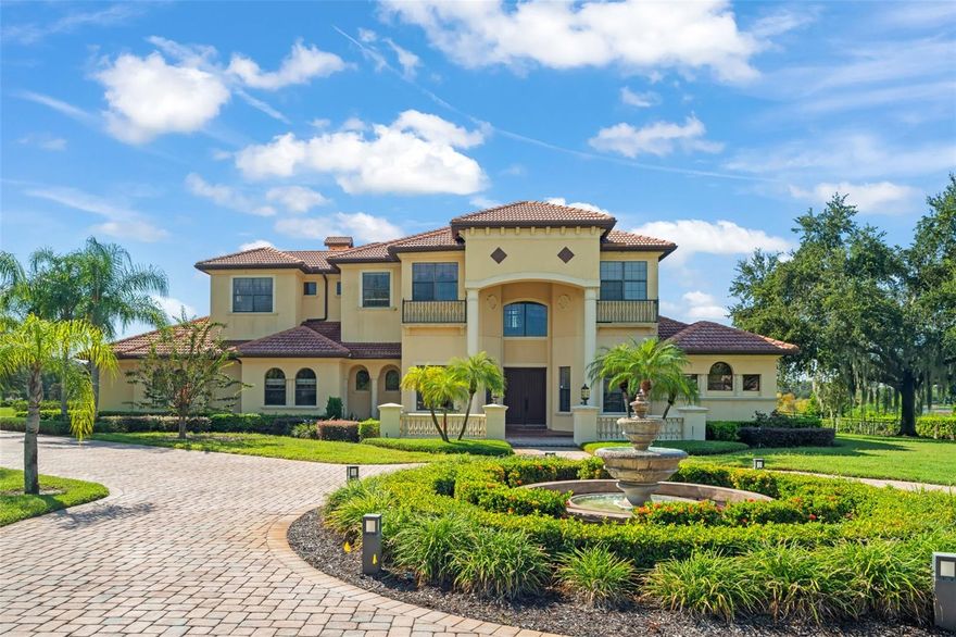 Tucked inside one of Windermere’s most exclusive guard-gated communities, this extraordinary custom-built estate is more than a home — it’s a destination. With 4,655 sq. ft., four bedrooms, five and a half baths, a detached in-law suite, and nearly two acres of pristine lakefront land, it represents the pinnacle of Central Florida luxury. Set on a quiet cul-de-sac, the residence blends timeless craftsmanship with modern amenities, offering both privacy and grandeur. Whether you seek a multigenerational sanctuary, an entertainer’s retreat, or a tranquil everyday escape, this property delivers it all. A winding driveway welcomes you to landscaped grounds framed by mature trees and sweeping lawns. The nearly two-acre lot is a rarity in Windermere, offering openness and privacy rarely found in guard-gated communities. At the water’s edge, a private dock provides access to a private ski lake — perfect for boating, skiing, or sunset cruises.
As night falls, the skyline transforms into your own private theater. From your backyard or expansive picture windows, you’ll enjoy nightly fireworks from Walt Disney World — an exclusive show few homeowners can claim. Thoughtfully designed to maximize the lot and views, the home emphasizes connection to nature with soaring ceilings and picture windows that frame the lake. Light-filled open spaces invite both lively gatherings and peaceful mornings. Inside, the foyer flows into a spectacular living room anchored by lake views. The chef’s kitchen features custom cabinetry, high-end appliances, and an oversized island, opening seamlessly to dining and living spaces. Every meal, whether casual or elegant, is elevated by sweeping water vistas. The primary suite, located on the main floor, is a true haven with direct outdoor access and serene lake views. The spa-like en-suite features a soaking tub, dual vanities, and walk-in shower, with abundant closet space for ultimate convenience With four bedrooms and 5.5 baths, the home balances elegance with flexibility. The detached in-law suite — complete with separate entrance, living area, bedroom, and bath — is ideal for aging parents, adult children, guests, or even a private office. Offering both independence and connection, it defines multigenerational living at its best.
Whether hosting indoors in the great room and chef’s kitchen, or outdoors along the lake, this home was made for unforgettable gatherings. Picture holiday dinners, lakeside barbecues, or evenings with wine as fireworks reflect across the water
Land is everything, and this nearly two-acre property is extraordinary. With ample room for future additions — from a resort-style pool to lush gardens — it offers a rare blend of seclusion, space, and lakefront access. Located in one of Windermere’s premier guard-gated neighborhoods, residents enjoy 24/7 security, prestige, and community pride. Windermere itself is among Central Florida’s most coveted addresses, known for top schools, charming character, and easy access to Orlando’s business and entertainment hubs. This estate is defined by its nightly show — fireworks lighting up the lake from Disney. More than a view, it’s a lifestyle: mornings on the dock, afternoons on the water, evenings under a glowing sky. This isn’t just a home. It’s an escape, a sanctuary, and a stage for life’s best moments. For those seeking a property that combines size, luxury, flexibility, and exclusivity, this Windermere estate is unmatched.