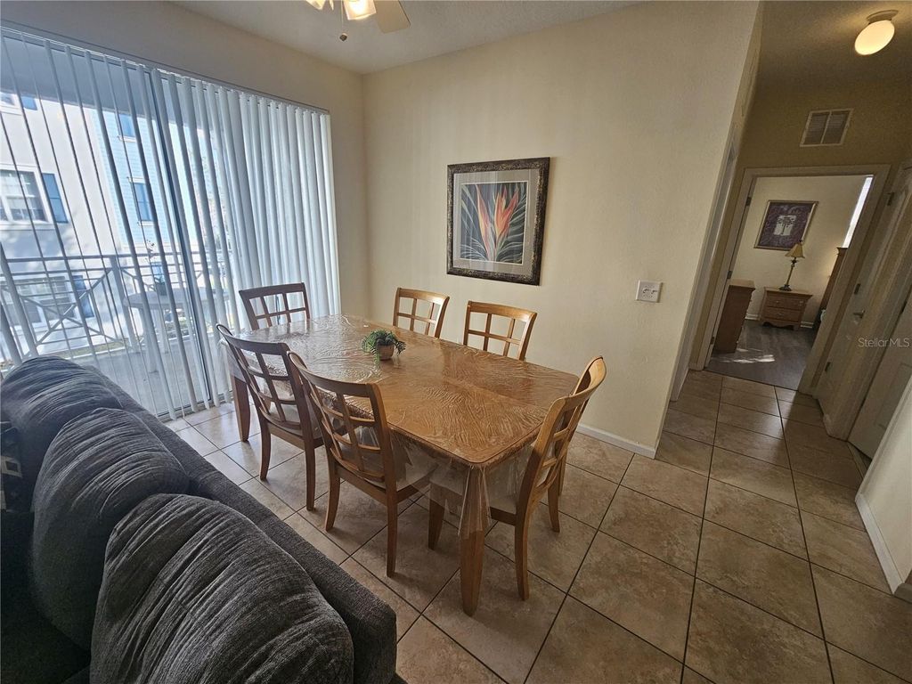 Photo of 5255 Cane Island Loop #204, Kissimmee, FL 34746 (MLS # O6380910)
