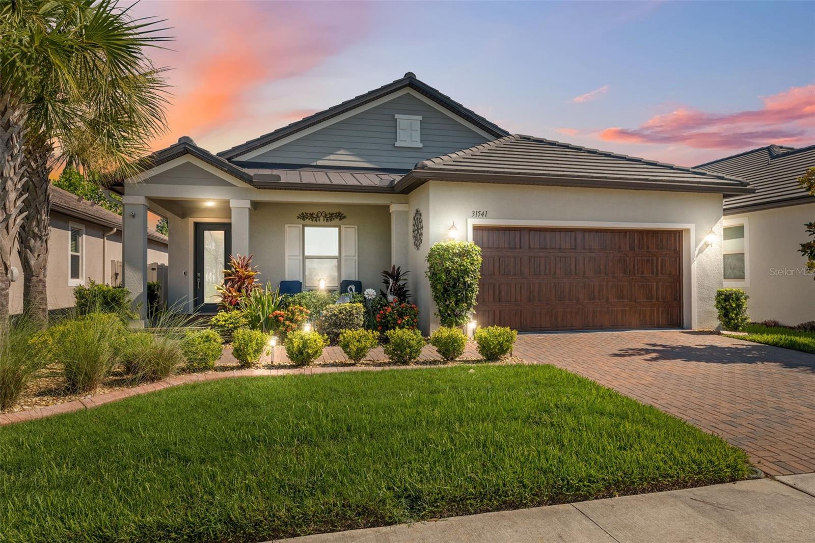 Welcome to your Dream Home in the popular Mirada Lagoon Community. Located in the Medley 55+ neighborhood which offers almost countless activities and amenities. This stunning 2 bed 2 bath + flex room home is very spacious and has an awesome open floor plan. This single story 1770 Sqft is full of upgrades noticeable from second you pull up . The perfectly manicured yard with curbing on flower beds. Also, the mulch has been replaced to rock for a better look and better drainage. The front door has been upgraded to a gorgeous glass insert. upon entering you notice the upgraded Luxury Vinal floors through the majority of house. This was not original but was a massive upgrade by homeowner. You will notice the crown molding through out ,plus great chandeliers and oversized fan. When entering the kitchen you will see beautiful stainless appliances , quartz countertop with a back splash that ties the room together. Fans in all bedrooms and flex space. Master bedroom is very spacious with plenty of light. Master bath has quartz countertops with Jack and Jill sinks. Stunning ceramic tile stand up shower with a corner bench. The real treat is the giant back yard 33 x22 patio. 10 x 18 enclosed under roof . A great place for a party!!! Garage is 20 x20 plus has a *8 x 9 work shop or golf cart area .Mirada is a golf cart community.
Medley at Mirada is a Resort Style * no maintenance living in the exclusive 55+ gated community featuring private amenities . The community features beautiful Clubhouse, restaurant/ bar, 24 7 fitness center, large pool with lap area , pickle ball courts , tennis courts ,dog park , indoor dog wash station billiards and more. Events offers Zumba, water aerobics. Mahjong, Tai Ch i, and assorted card games. Also has a large banquet hall for events like concerts etc.
The Mirada community has Florida's Largest Man Made Lagoon " 15 acres ".Community residents have access to lagoon at no charge and get 25 guess passes and really reduce prices on additional passes and upgrades. The lagoon does a monthly calendar. it does concerts , bingo, trivia night, movie night and much more. Many residents enjoy the swim up bar , restaurants , or just relaxing. Include with your HOA fee you get private landscaping ,exterior maintenance , high speed internet and expansive cable package.
CDD is included in your property tax amount.