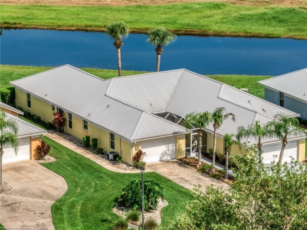 THE PERFECT FLORIDA VILLA!!! A perfectly manicured row of Villas set in the heart of Spring Lake is a golfers dream. Overlooking serene canals and surrounded by the Sebring International Golf Resort, home to four golf courses perfect for improving your game. This home has been meticulously kept and updated beautifully. Two spacious bedrooms and two bathrooms are complemented by a wonderful open floor plan. As you walk in you are greeted with a large foyer leading to the dining room and kitchen. The kitchen features beautiful white cabinets, a breakfast nook and PLENTY of cabinet space! Located within walking distance to the Club house, Golf course and Speak-Easy, this charming home boasts a Very spacious primary suite with a nicely appointed on-suite with both shower stall and a separate tub as well as 2 sizable closets. The guest suite adjoins the 2nd bathroom and has a walk-in shower. Bring your golf clubs and toothbrush and move right in! Spring Lake’s vibrant community offers new pickle-ball courts, a boat ramp to Lake Istokpoga for fishing, several parks, paved trails for walking and biking, a dog park, Championship golf courses and so much more.The HOA covers exterior insurance, and exterior upkeep, lawn care, high speed internet, and basic cable TV. Make your appointment to see it today.