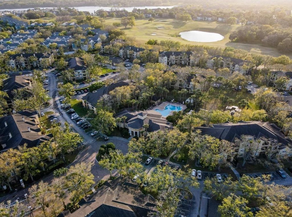 Photo of 2632 Robert Trent Jones Dr #130, Orlando, FL 32835 (MLS # O6392889)