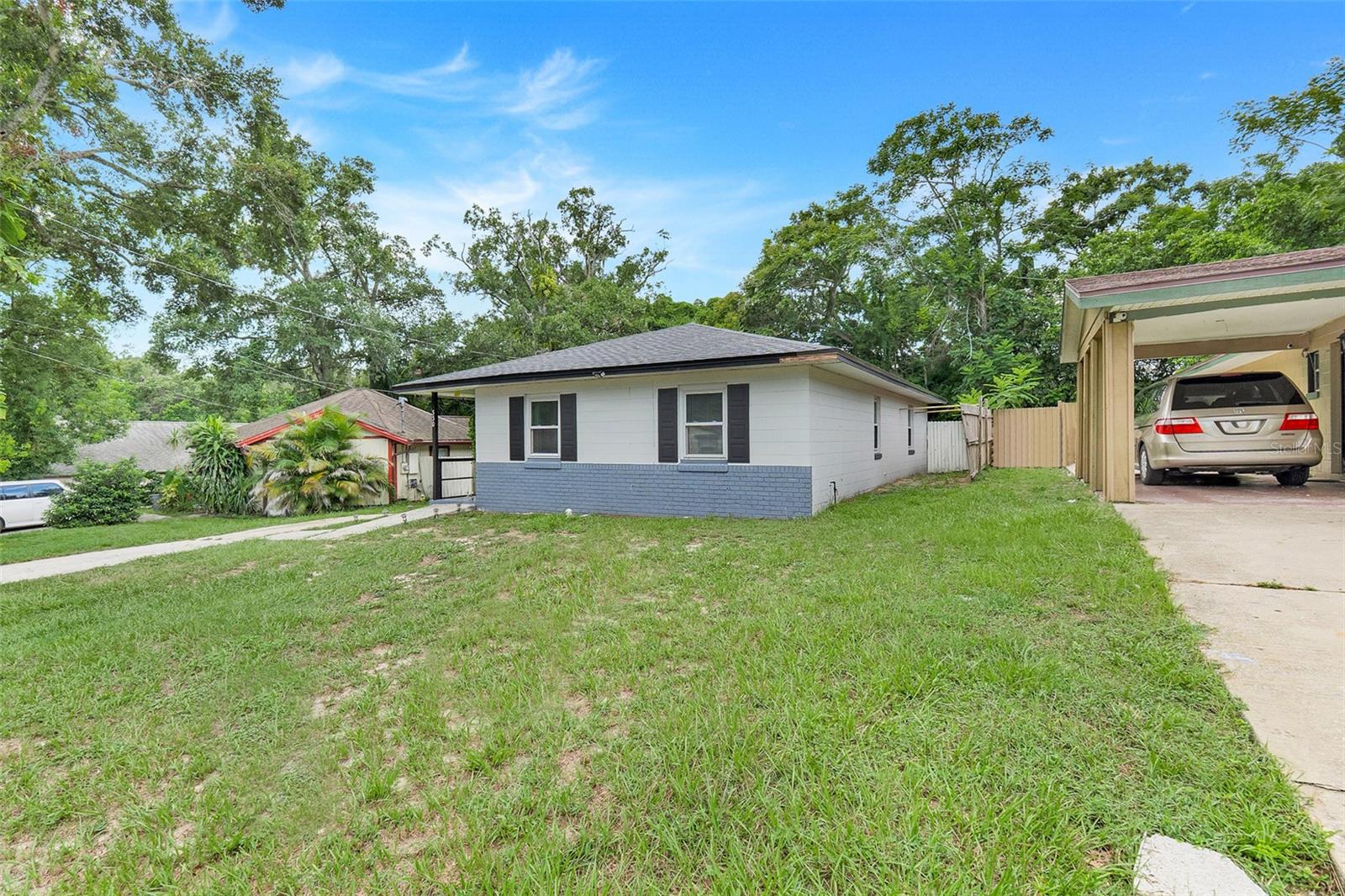 Welcome to your next home at 330 S Lancelot Ave, Orlando, FL 32835. This charming house, up for sale, is a perfect blend of comfort and convenience, designed to cater to the needs and aspirations of a modern family or individual. Spanning 1,170 square feet, the interior of this house is thoughtfully laid out, featuring 3 cozy bedrooms and 1.5 practical bathrooms. Each room in the house is equipped with ceiling fans and boasts high ceilings, contributing to a sense of spaciousness and airiness throughout. The hard flooring running across all rooms not only adds elegance but also ensures easy maintenance for busy lifestyles. The house is move-in ready, waiting for you to make it your own. Large windows illuminate the living spaces with natural light, making the home feel welcoming at any time of day. Whether you’re a budding chef or someone who enjoys simple meals, the practical kitchen space is sure to meet your needs. Located in the vibrant city of Orlando, this home places you at the center of convenience. You’ll find yourself conveniently located near a plethora of shopping destinations, diverse dining options, and world-renowned theme parks, offering endless entertainment opportunities for you and your guests. Proximity to major roads ensures that your commute or travels are as hassle-free as possible. This property is not just a house; it’s a gateway to the lifestyle you’ve been dreaming of, set in a community that’s rich with opportunities and conveniences. Whether you're settling down, looking for a change of scenery, or seeking a strategic investment, 330 S Lancelot Ave presents a golden opportunity to claim a slice of Orlando’s vibrant life. Don’t miss out on making this house your new home. Come see the potential and let your imagination take the lead in turning this property into your personal haven.
