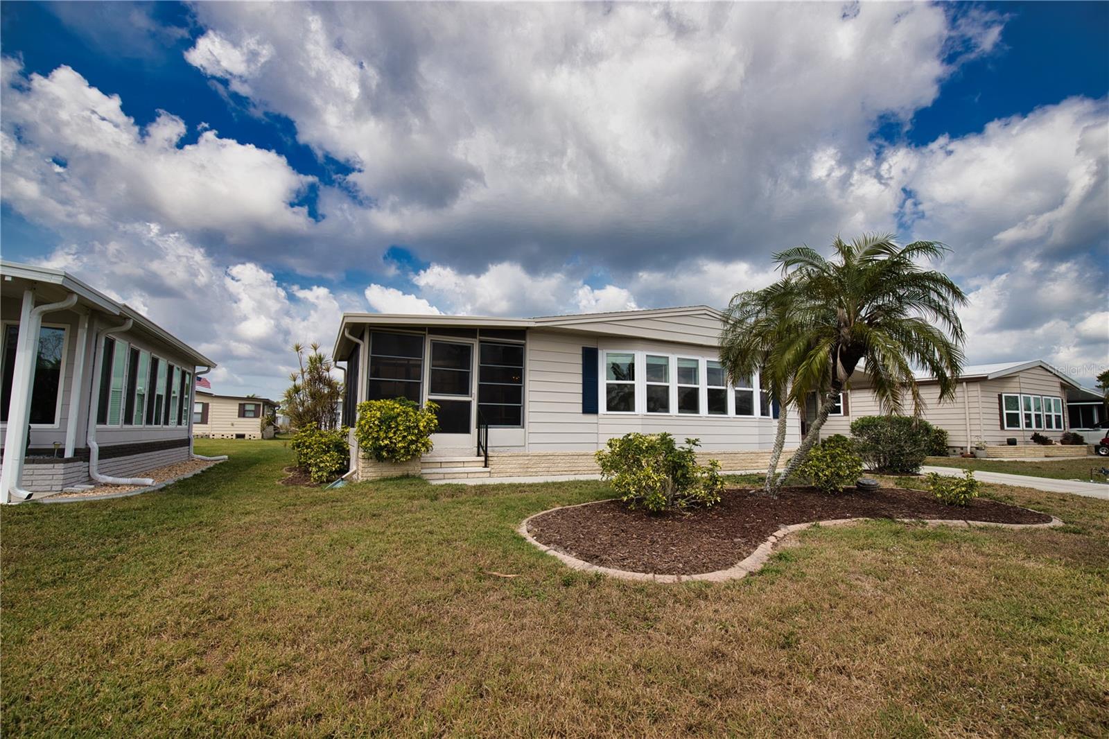 Discover the enchanting Florida dream lifestyle in this delightful home, nestled on a tranquil street within a vibrant 55+ community. Step inside to experience the airy, open layout that seamlessly blends the kitchen and dining area with a cozy living room, creating an inviting atmosphere perfect for entertaining friends and family. The kitchen boasts a charming center island, complete with a built-in range and a lovely eating nook, making it the heart of the home. The spacious living room basks in an abundance of natural light from a stunning wall of windows, enhancing its warm and welcoming appeal. The Florida Room offers additional space for both relaxation and social gatherings, further enriching your living experience. Retreat to the serene primary bedroom, a true sanctuary featuring an ensuite bathroom with a luxurious walk-in shower. Your guests will feel right at home in the thoughtfully designed guest bedroom, conveniently located near a well-appointed bathroom. This is an exceptional opportunity to personalize, update, and truly live the Florida dream you’ve always desired. With recent improvements, including new windows (2024) and a brand-new roof (2023), this charming home is not just move-in ready but also offered turn-key. Embrace the lifestyle you've always wanted!
Discover the enchanting community of La Casa, where 974 stunning homes are elegantly nestled among a tapestry of native trees, offering a serene escape surrounded by spacious common areas and eight picturesque lakes. Our generous lots average an impressive 60 by 80 feet, providing ample space for your dream home. Perfectly situated between Sarasota and Fort Myers, La Casa embodies the ultimate lifestyle on Florida’s Gulf Coast—a true boater's paradise with direct access to the breathtaking Gulf of Mexico. Enjoy the convenience of nearby shopping, exciting sightseeing, world-class golfing, and abundant fishing and boating opportunities, all while indulging in the rich culture and refined elegance that Southwest Florida is celebrated for. As you immerse yourself in the warmth of Southwest Florida’s winters, you’ll find yourself in a relaxed and unhurried atmosphere, far removed from the hustle and bustle of the east coast. Our community is adorned with lush, mature landscaping that reflects the loving care both residents and management dedicate to preserving its beauty. At La Casa, you’ll discover some of the finest pools in the area. Our crowning jewel is a magnificent 40 by 60-foot swimming pool, maintained at a perfectly inviting 87 degrees. Just a short stroll away, you’ll find our cozy 20 by 40-foot pool, nestled charmingly between the clubhouse and the Activity Building. Both pools feature adjacent hot tubs, ideal for unwinding after a refreshing day of golf or an invigorating game of tennis. Stay connected while basking in the sun with our complimentary wireless Internet (Wi-Fi), available at the Clubhouse, Activity Building, and Recreation Hall. Whether you’re catching some rays or catching up on emails, La Casa has it all. Does this sound appealing? La Casa is not just a community; it’s a welcoming family-friendly haven. Enjoy the tranquility of your surroundings, with the vibrant energy of nearby attractions just a heartbeat away. Come visit our charming self-contained oasis and experience firsthand why La Casa is the ultimate destination for snowbirds and year-round residents alike!