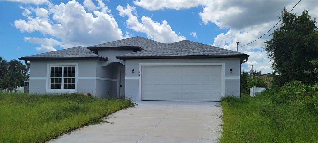 Photo of 1035 Cragmont Avenue, North Port, FL 34288 (MLS # A4665104)