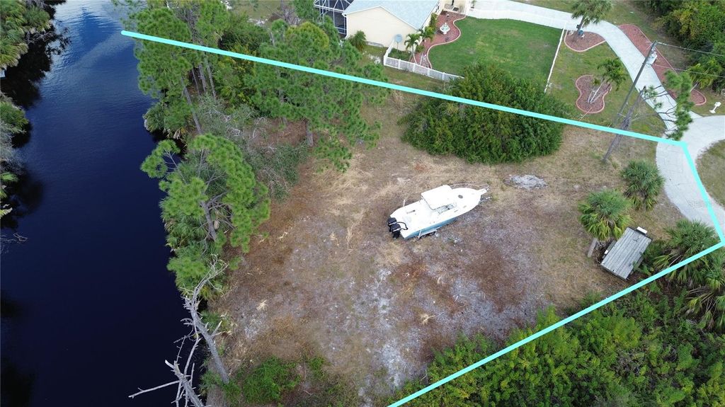 Photo of 7711 Cosmo Court, Port Charlotte, FL 33981 (MLS # D6134931)