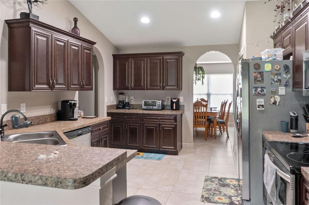 Photo of 504 Malauka Radial, Ocklawaha, FL 32179 (MLS # TB8421197)