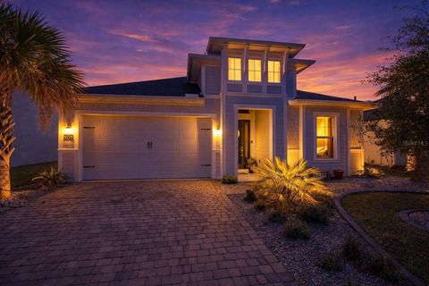 Photo of 6219 Woodhaven Village Drive, Port Orange, FL 32128 (MLS # NS1087603)