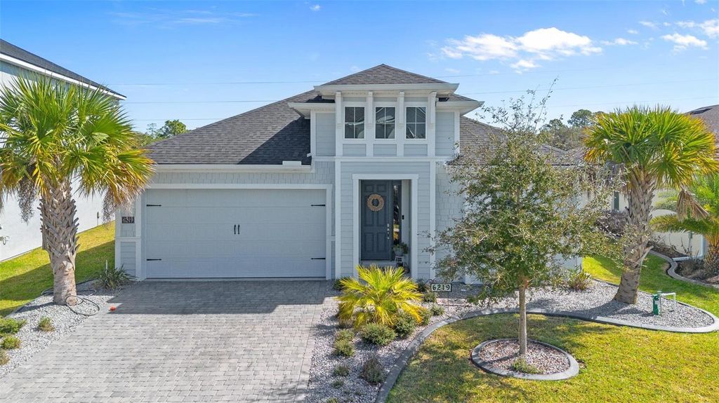 Photo of 6219 Woodhaven Village Drive, Port Orange, FL 32128 (MLS # NS1087603)