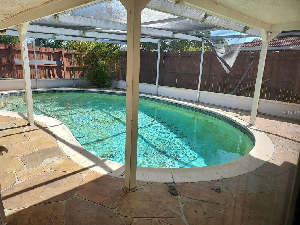 Photo of 3206 Pinon Drive, Holiday, FL 34691 (MLS # W7876389)