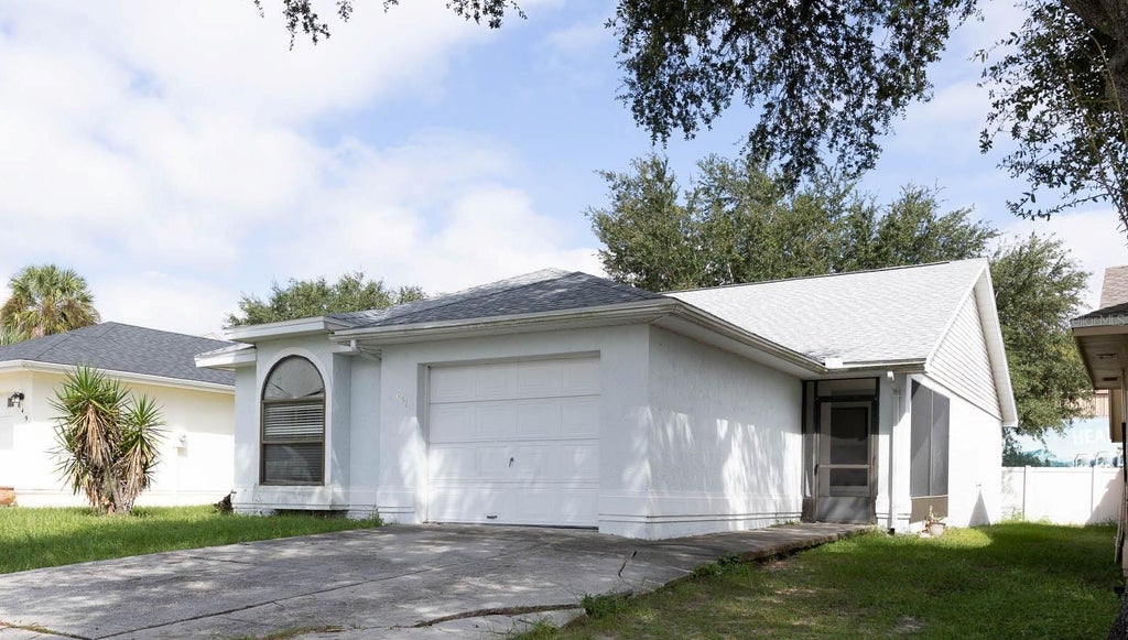 Photo of 651 Lake Dexter Circle, Winter Haven, FL 33884 (MLS # P4939989)
