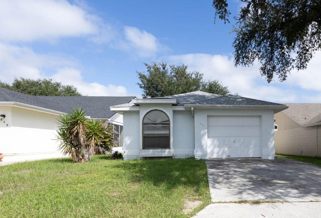 Photo of 651 Lake Dexter Circle, Winter Haven, FL 33884 (MLS # P4939989)