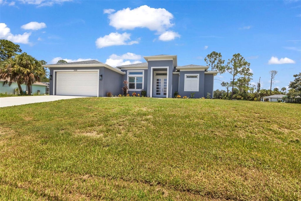 Photo of 2439 Wilburn Terrace, North Port, FL 34288 (MLS # C7528490)