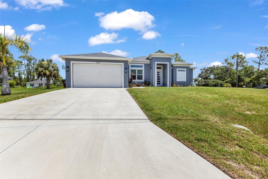 Photo of 2439 Wilburn Terrace, North Port, FL 34288 (MLS # C7528490)