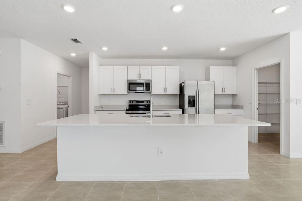 Photo of 13673 Tropical Breeze Way, Hudson, FL 34669 (MLS # TB8421517)