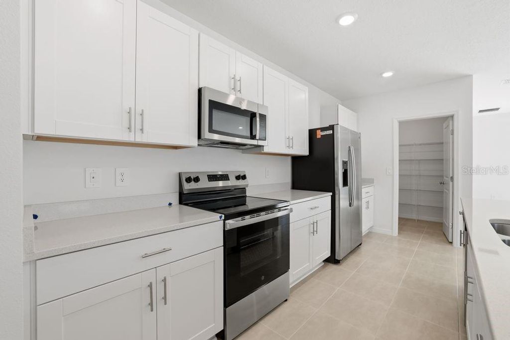 Photo of 13673 Tropical Breeze Way, Hudson, FL 34669 (MLS # TB8421517)