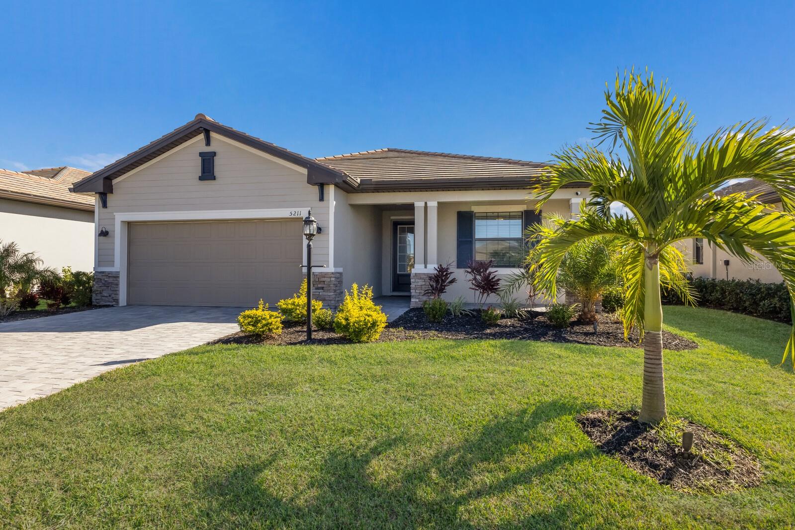 This home is located in Lakewood Ranch’s highly coveted Lorraine Lakes community.
• 1,849 square ft.
• (3) Beds
• (3) Baths
• Water view
Lorraine Lakes is a serene and beautiful neighborhood within the acclaimed Lakewood Ranch master-planned community, offering resort-style living and a wide variety of amenities. This single-story home features a split floorplan that divides the comfortable bedrooms with an open layout among the dining room, kitchen, and family room. An attached lanai offers indoor-outdoor hosting opportunities, while the nearby owner’s suite showcases an oversized walk-in closet and a spa-style bathroom. Rounding out the home is a convenient two-car garage.
What makes this home unique is all of the below upgrades:
• White cabinetry
• White granite countertops
• (8) professional landscape lights
• Ceiling garage storage
• Frigidaire Professional Counter depth refrigerator – freezer
• KitchenAid top-end dishwasher w/ 3rd rack
• KitchenAid Professional Gas Range
• KitchenAid convection microwave
• Google smart home (outside cameras, door lock and doorbell)
• High-end Hunter ceiling fans throughout with Bluetooth and remotes
• Custom closets in both master bedroom closets
• Custom painted throughout
• Vertical blinds on the interior slider
• Custom roller shade on the front door
• Tile throughout
• Crown molding
• Gutters around the entire house
Owner would prefer to sell completely turn-key with additional costs, if you’re interested in turn-key, there would be an addendum to the contract for you to purchase all of the furnishings, all of these items are high quality, basically brand new, and have only been in the home for less than a year
