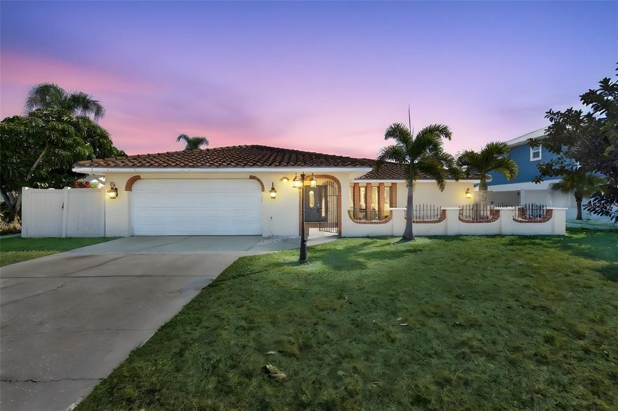 Florida Living at its best!! Beautifully remodeled 3/2 bath home with sleek finishes offering a piece of coastal charm and modern comforts for its new owners. Don't miss this chance to own prime waterfront property in the desirable boating community of Apollo Beach on a deep salt water canal with no bridges, and direct access to the Bay. You'll love being welcomed by the large courtyard prior to entering the thoughtfully designed open and split floor plan. Retreat to tranquility, in the expansive sunroom overlooking the large backyard with close to 100 feet of beautiful water views. Enjoy a large dock with electric and covered 6,000 lb boat lift ready for your nautical adventures including kayaking, fishing or simply soaking up some sun. Don't miss this chance to own prime waterfront property in the highly sought-after Sabal Key neighborhood only minutes from waterfront dining, marinas, parks, and shopping. NO HOAS or CDDS so bring ALL of your toys and live the Florida Life on Your Terms!!  It's Time to Go Coastal and "Seas" this gem.