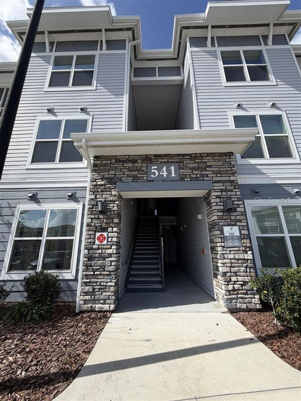 Photo of 541 Academy Drive #204, Kissimmee, FL 34744 (MLS # O6396542)