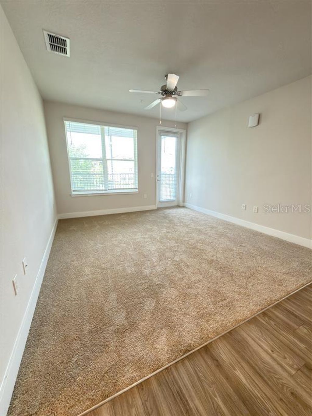 Photo of 541 Academy Drive #204, Kissimmee, FL 34744 (MLS # O6396542)