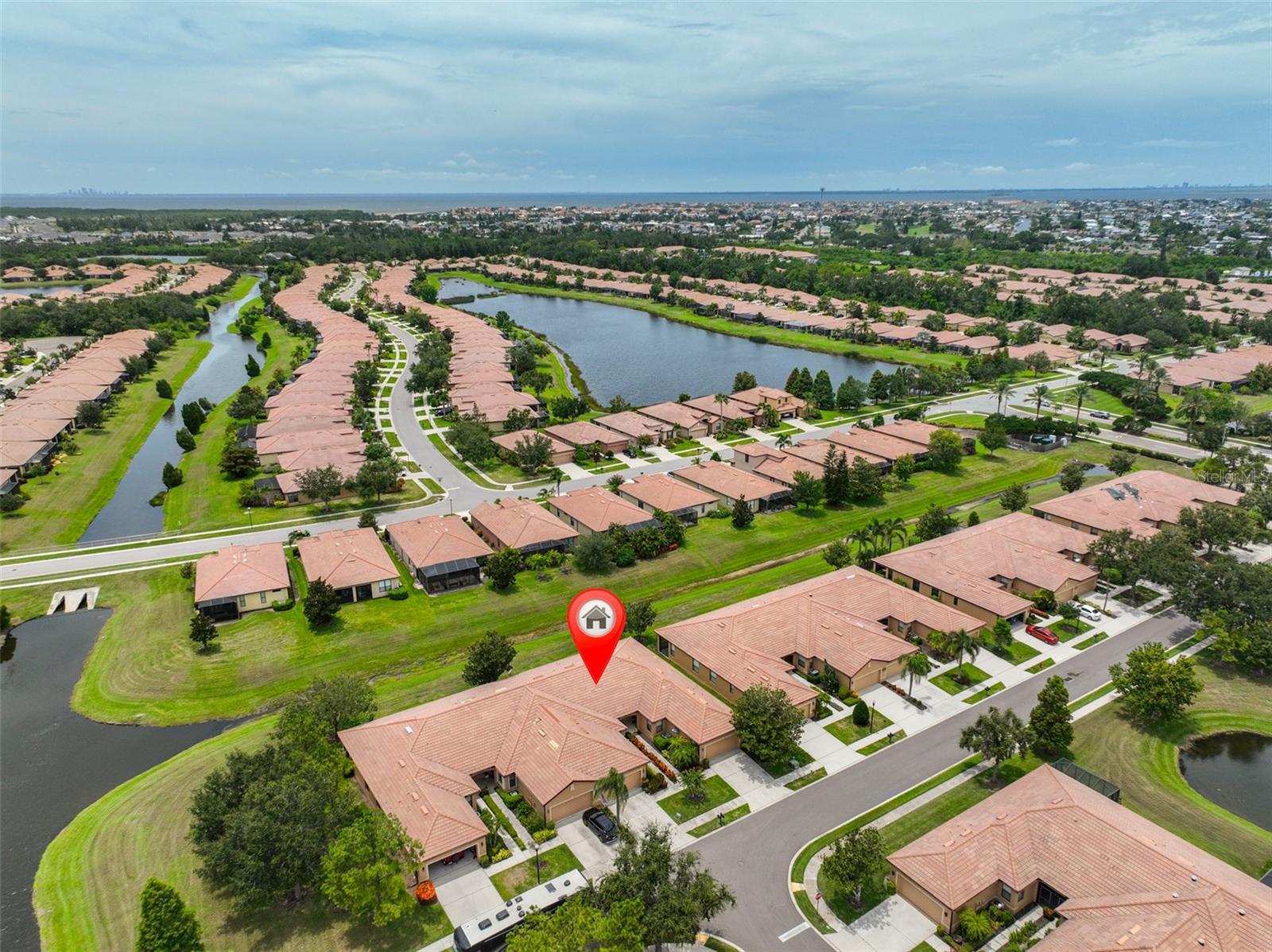One or more photo(s) has been virtually staged. New Rental in SouthShore Falls, the sought after 55+ Gated Community in Apollo Beach, FL Well-maintained 2-bedroom, 2-bath home with bonus room perfect for guests or a home office. Located on a quiet dead-end street with no backyard neighbors for added privacy. Features include inside laundry, tile flooring, screened lanai, and an open floor plan ideal for comfortable living. SouthShore Falls is a 24/7 gated and guarded 55+ community offering resort-style amenities including 14,000 sq. ft. clubhouse, two pools, a resistance pool, and spa, fitness center, tennis, pickleball & bocce ball courts, Library, game/card room, billiards, arts & crafts studio and Internet café & scenic nature trail. It is conveniently located near shopping, dining, medical facilities, and major roadways. Rent includes access to all community amenities and all exterior maintenance. Schedule your private tour today!