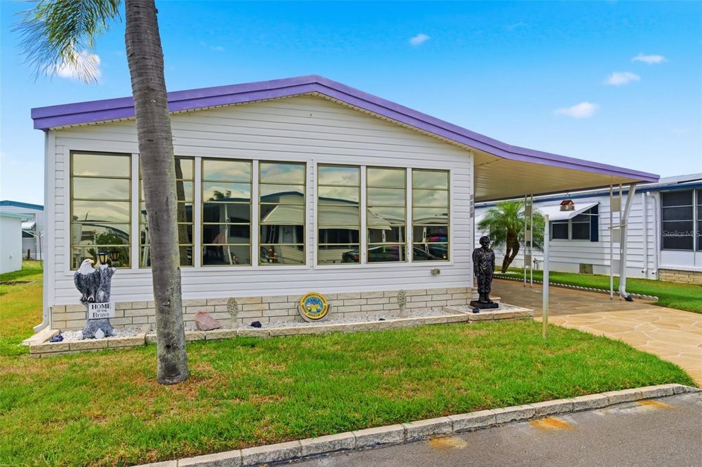 Photo of 2101 Kona Dr, Holiday, FL 34691 (MLS # W7884636)