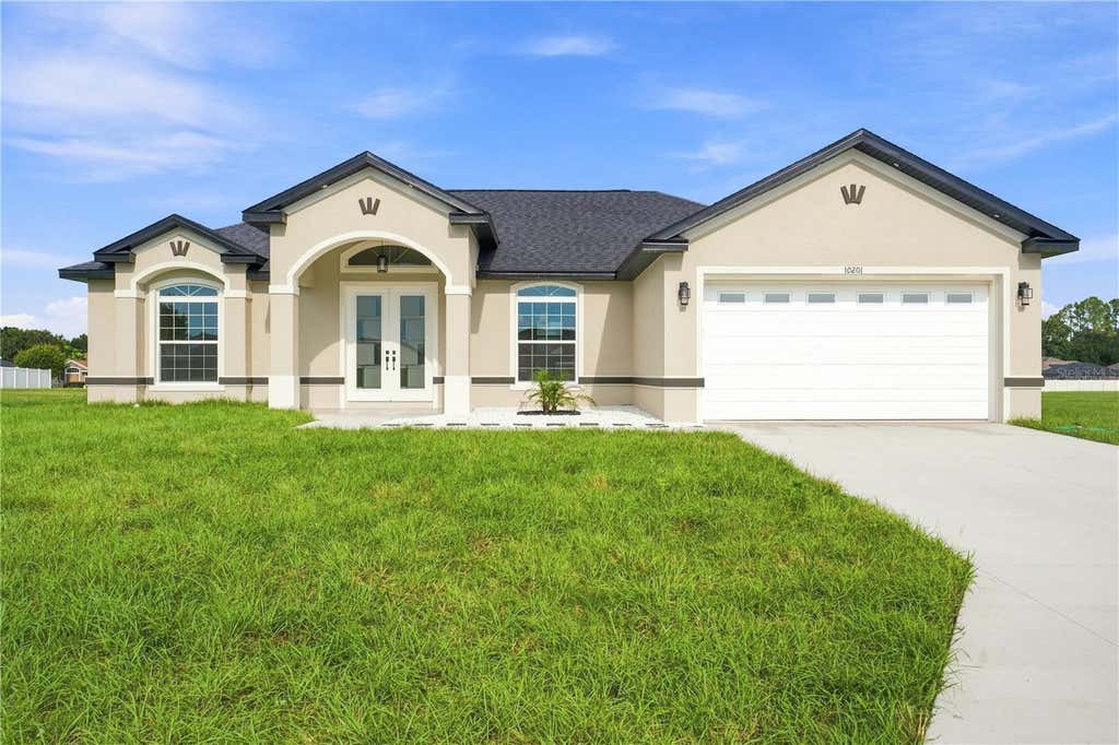 Photo of 10201 SE 68th Court, Belleview, FL 34420 (MLS # OM731164)
