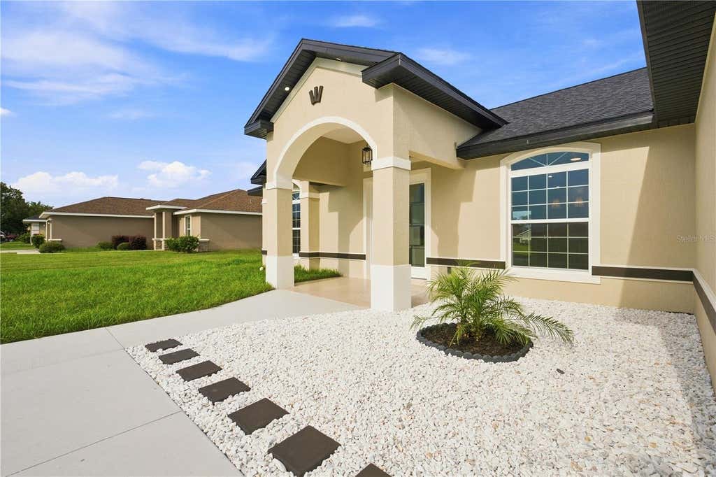 Photo of 10201 SE 68th Court, Belleview, FL 34420 (MLS # OM731164)