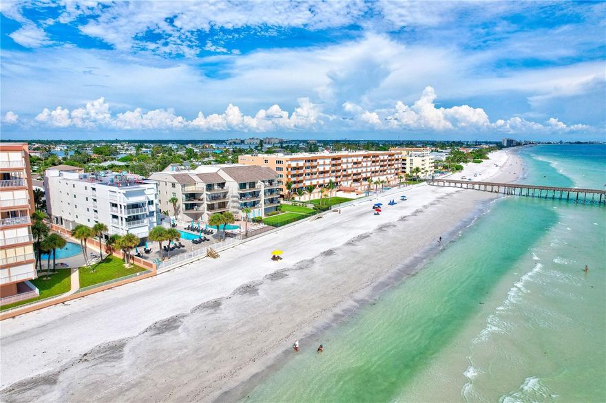 THE ONLY 4 BEDROOM BEACHFRONT ON THE GULF WITH DIRECT VIEWS FOR UNDER $2M. RARE opportunity to own a FULLY REMODELED beachfront FOUR (4) Bedroom, THREE (3) Bathroom LARGE condo (1,835 sq ft), directly on the beach, with unobstructed direct views of the Gulf of America. Unit being sold as fully furnished which gives great opportunity for cost seg benefits. This ONE-OF-A-KIND luxury end unit comes with an OVERSIZED private balcony (partially covered) providing an additional 385 sq. ft of private outdoor space AND its OWN private spiral staircase to the garage/pool area just steps away from the beach. Including two garage parking spaces. All NEW hurricane windows and sliding glass doors throughout as well as NEW electric hurricane shutters for the balcony offering peace of mind. Additional features include 2 HVAC systems, one replaced in 2022 that assures your year-round comfort. Mariner’s Light is an exclusive boutique 12-unit community located at the beautiful Redington Beach. The beachfront property has a year-round HEATED swimming pool just steps from the pristine beach. A PET FRIENDLY community allowing up to 2 pets, 25 lbs each. A wonderful park is also located across the street. In 2021 the building completed a $1.2M restoration and renovation project, completely overhauling the entire building; including a new elevator, new sprinkler system, new fire alarms, remodeled hallways and lobbies, new lobby windows and doors, all new guardrails to the entire building, including the balconies, all new gemstone balcony flooring. Building already has a new roof and no special assessments coming. An engineer oversaw the entire restoration and renovation project, and all the recommendations were implemented. Mariner’s Light is WAY AHEAD of the game! INVESTMENT INCOME - Whether you are looking to live on the beach or looking to purchase an investment to generate income OR a little of both, use it when you want and rent when you’re not, you have that flexibility. The property has a minimum 7-day rental policy and allows one renter in a 30-day period. In walkable distance to many amazing restaurants and shops, this is a great location. Don't miss this opportunity to own a slice of paradise in Redington Beach. It’s time to BUY THE BEACH CONDO. Schedule your private viewing today and make it a reality.