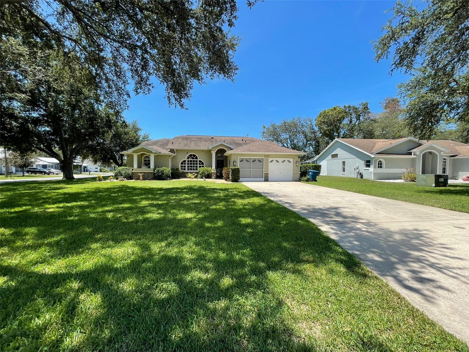 Live the Florida Lifestyle in Regency Oaks!
This stunningly remodeled 3 bedroom, 2 bath home with a 2-car garage and private pool is the perfect blend of comfort, style, and convenience. Available fully furnished, all you need to bring is your suitcase—plus, lawn and pool maintenance are included for truly stress-free living!
Step inside to an open-concept floor plan with vaulted ceilings and designer touches throughout. The chef’s kitchen features stainless steel appliances, stone countertops, open shelving, custom cabinets, and a built-in wine cooler. The spacious primary suite boasts a custom walk-in closet and spa-inspired bath with double vanities, a garden tub, and a walk-in shower.
The fun continues outside with a large screened lanai and sparkling private pool—A game room is included, making this home perfect for family nights or entertaining friends.
Why You’ll Love It Here:
3 Bedrooms | 2 Bathrooms | 2-Car Garage
Fully Furnished + Game Room
Private Pool + Lanai (Maintenance Included)
Lawn Care Included = Stress-Free Living
Spa-Like Primary Suite
Stylish Open-Concept Design
Location, Location, Location!
Situated in the desirable Regency Oaks community, you’re just minutes from everything Hernando County has to offer. Watch the mermaid show at Weeki Wachee Springs, kayak with manatees in Crystal River, spend a day on the sand at Pine Island Beach, or tee off at one of Spring Hill’s top golf courses. For dining and shopping, Commercial Way and Cortez Blvd offer everything from big-name retailers to locally owned restaurants.
Whether you’re looking for a seasonal retreat or a longer stay, this home offers the best of Spring Hill living—modern comfort, fun amenities, and endless adventures just around the corner.