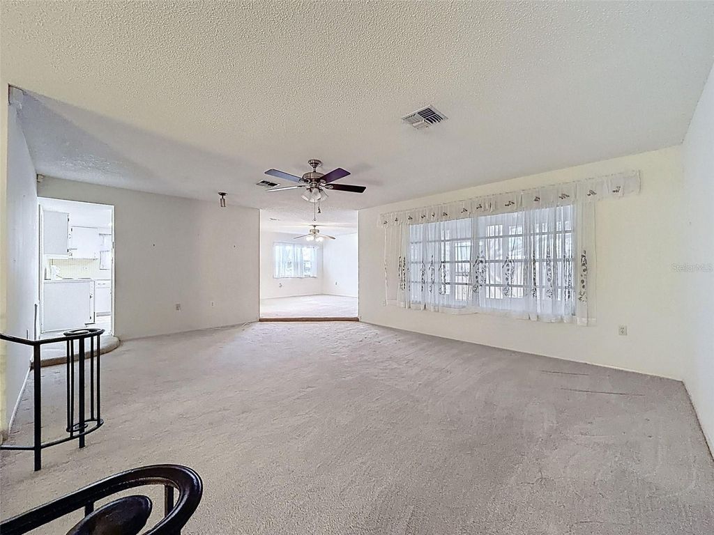 Photo of 9811 Woodstock Lane, Port Richey, FL 34668 (MLS # W7884997)