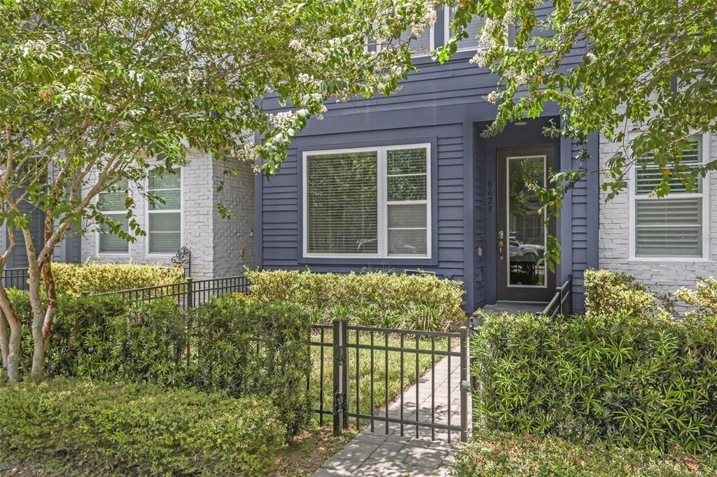 Photo of 8629 Tavistock Lakes Boulevard, Orlando, FL 32827 (MLS # O6427629)