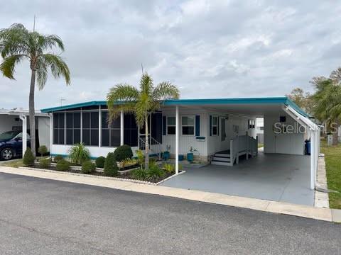 DOUBLE WIDE WITH 2 BEDROOMS AND 2 BATHROOMS. This 1608 sqft home offers 2 bedrooms and 1-1/2 bathrooms. Inside you will find open space living that offers a Living Room, Dining Room and Florida Room. This home has 2 entrances off the carport. One enters the front Florida Room (with a glass sliding glass door to the spacious Living Room) and the other enters the Kitchen/Dining Room area and is wheelchair/ramp accessible. The Kitchen has plenty of cabinet space and a breakfast counter. There is a window over the double porcelain sink area that allows for even more lighting. The refrigerator and stove/oven are new. The formal Dining Room is off the Kitchen and has plenty of natural light streaming in from the windows. The Dining Room opens to the formal Living Room which also has an abundance of windows and a sliding glass door to the Florida Room. You have the option to open or close the sliding vinyl paned windows and still be comfortable. No lack of Florida sunshine here!! The Main Bathroom is off the hallway and has a shower and a single sink vanity. The Guest Bedroom is at the end of the hallway and is surrounded by windows which makes it bright and airy. It even has its own walk-in closet. The Primary Bed Room is spacious with a good sized walk-in closet, and has its own en-suite half bathroom and an emergency exit door to the outside. All the windows on the main body of this home are double paned, thermal insulated, vinyl windows that tilt in for easy cleaning. The central HVAC is 2024. The Laundry Room with a workbench and newer washer/dryer are in the utility shed at the end of the widened (by 2 feet) 2 car carport where you can also park your golf cart. The backyard has a spacious tool and storage shed. The exterior of the home is trimmed in Lagoon Blue and in the evening the home is self-illuminated in ambiance mood lighting. The low monthly maintenance fee of $210.00/month makes Florida living affordable. Golden Gate is a 55+ resident owned community with private maintained roads which offers many amenities to its residents. There is the main Community Center with men’s and women’s clubs, library/game room, social room with a stage and piano, outside covered picnic area, shuffleboard, horseshoe pit, bocce ball court, heated pool and spa, social activities, planned outings, movie nights, and so much more. The community is located close to a Walmart Super Store to which you can drive your golf cart. The store has designated golf cart parking! For the golf enthusiast there is the Mainlands Gulf Club just a signal light away. It is a public 18-hole Florida links style course. There are numerous stores and restaurants within a minute's drive away and is close to major airports and interstates. Best of all it is 15 minutes from the award-winning Florida Gulf Beaches. The listing price includes the cost of the land share which is valued at $76,000 per public records. The MHP is pet friendly with 1 pet allowed up to 20 pounds. While every attempt has been made to provide accurate information it is still up to the Buyer to verify all information measurements, details of this listing as well as the covenants, disclosures, codes, restrictions and rules of the mobile home park community. The sale and purchase of this property requires community approval. HOA Association is: Golden Gate Residents Association. Property Management is: West Coast Management, HOA Fee includes Water, Trash and Sewer