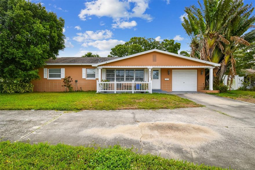Located in popular HOLIDAY PARK, this 2BR/2BA Home is Close to Tyrone Square Mall, Popular Restaurants, Tyrone Middle School, Tyrone Jr High School, Northwest Park and Pool. Only About 4 Miles to the Gulf Beaches at Treasure Island! NOTE: This Home can be Leased Either Unfurnished OR Partially Furnished. The Large Corner Lot has a Parking Pad on the Right Side, and a Circular Driveway Also! Good Size Covered Front Porch Area for your Patio Furniture and Potted Plants! Glass Decorative Panel Front Door. You’ll Love the Updated Features Such as Newer Ceramic Planked Tile Flooring. The Spacious Living Room has White Wood Window Shutters, Wainscoting, Custom Paint Color, Ceiling Fan, and the Room will Accommodate Larger Furniture. The Dining Room has White Color Wood Window Shutters, Attractive Hanging Light Fixture and Matching Wall Scones. The Dining Room Size Will Accommodate a Large Table and 6 Chairs. Ceiling Fans Throughout. The Kitchen Breakfast Bar has Bar Stools with Back Rests. A Chefs Kitchen has Crown Molding and Recessed Lighting, Black Color Marble Fleck Style Counter Tops, Textured Tile Backsplash, and Maple Cabinets with Lots of Storage and a Built-In Wine Bottle Rack & Wine Glass Rack! White Color Cast Iron Double Bowl Kitchen Sink with Gooseneck Faucet, which has a Window that Overlooks the Back Yard! Appliances include Stainless Steel Bottom Freezer Double Door Refrigerator, Dishwasher, Glass Top Range, Built-In Microwave. The Master Bedroom can Accommodate a King Size Bed and has Mirrored Closet Door. The Bathroom has a Glass Top Sink Cabinet with Round Mirror, Toilet, Bathtub, with Tiled & Painted Walls. The Garage has been Converted into Two Rooms: A Laundry Room with Full Size Electric Washer and Dryer, and a Long Built In Storage Cabinet. This Room Could be Used as a Small Home Office or Pet Bedroom! The Second Part of the Converted Garage is a Storage Room with an Extra Refrigerator! Big Back Yard with Open Patio and Privacy Vinyl Color White Fencing. Pet Okay, No Dangerous Breeds, Pet Application plus $350.00 Non-Refundable Pet Fee. Tenant is Responsible for Professional Yard Care. NOTE: This Home can be Leased Either Unfurnished OR Partially Furnished! Tenants are required to have renters’ insurance for their personal property and 300K liability with the owner as additionally insured.