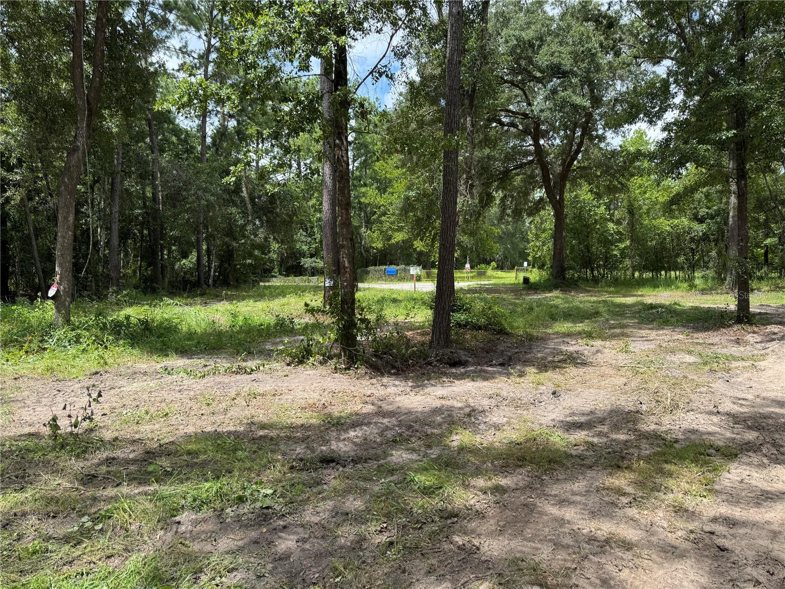 Property is located across the Sid Martin ball field, down the street from the 5 acre City Hall, and charter school. City sewer, city water, and electric is available and weekly garbage pick up. Waldo is a short 14 mile commute to Gainesville or Starke. Large lot would be ideal for a family. Come and enjoy the small town atmosphere but close to city shopping and medical facilities. They are numerous lakes nearby for fishing or just for relaxing. Located in the center of North Florida a short distance from both the Atlantic ocean and the Gulf of Mexico, but far enough to provide a hurricane buffer.This is one of five identical 83’ x 200’ lots, all with city water, sewer, and electric hookups—available individually at the same price.