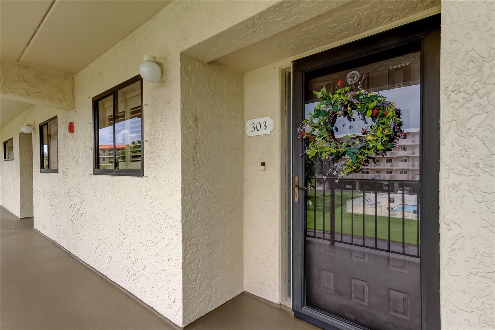 9490 HARBOR GREENS WAY 303