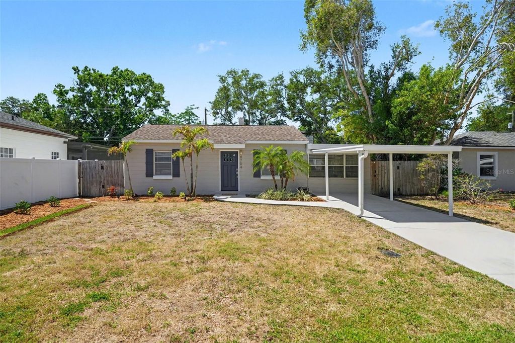 Photo of 4704 W Lawn Avenue, Tampa, FL 33611 (MLS # TB8503754)